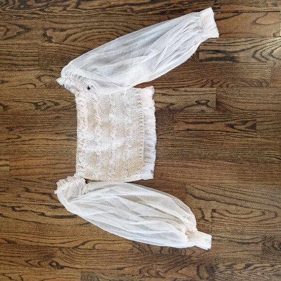 Chic Cream Crop Top with Elegant Design - Picture 2 of 10